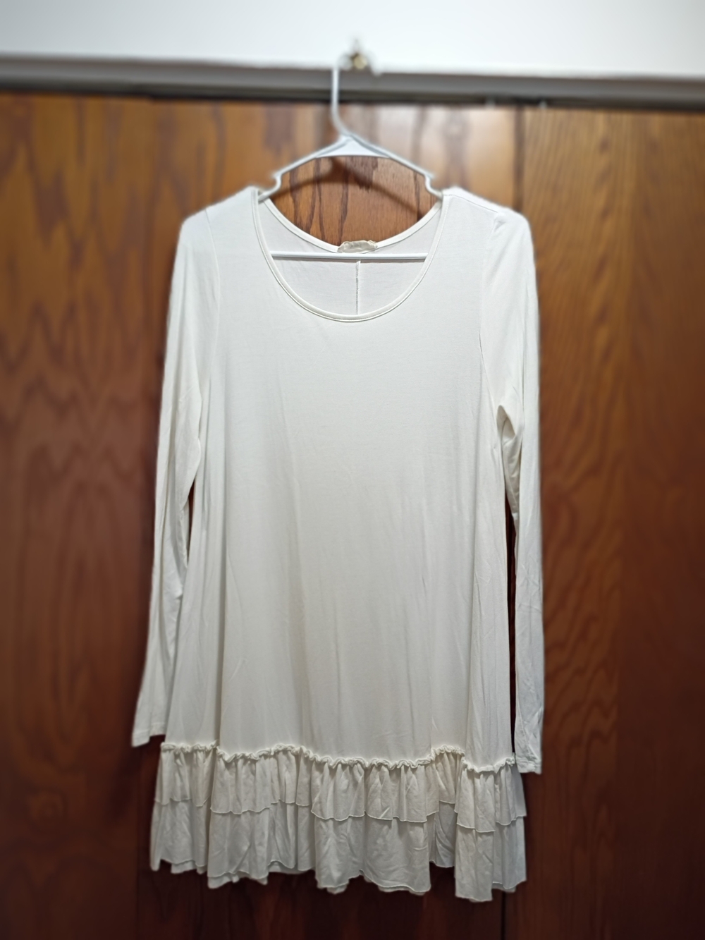 Easel Cream Long-Sleeve Ruffle-Hem Tunic.